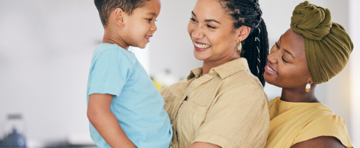 Female couple with adopted male child